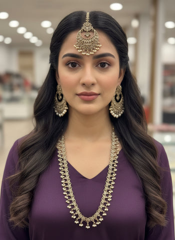 Gold A.D Necklace Set with Topaz Stones, Earrings & Tika