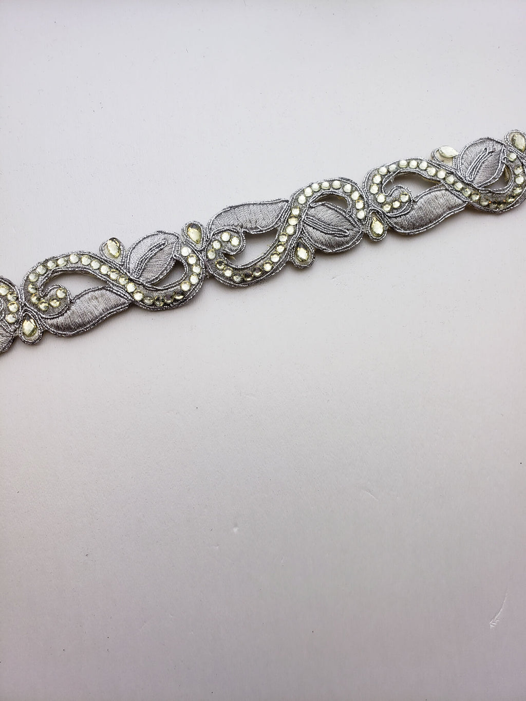 Silver cutwork with lt.yellow faux gems